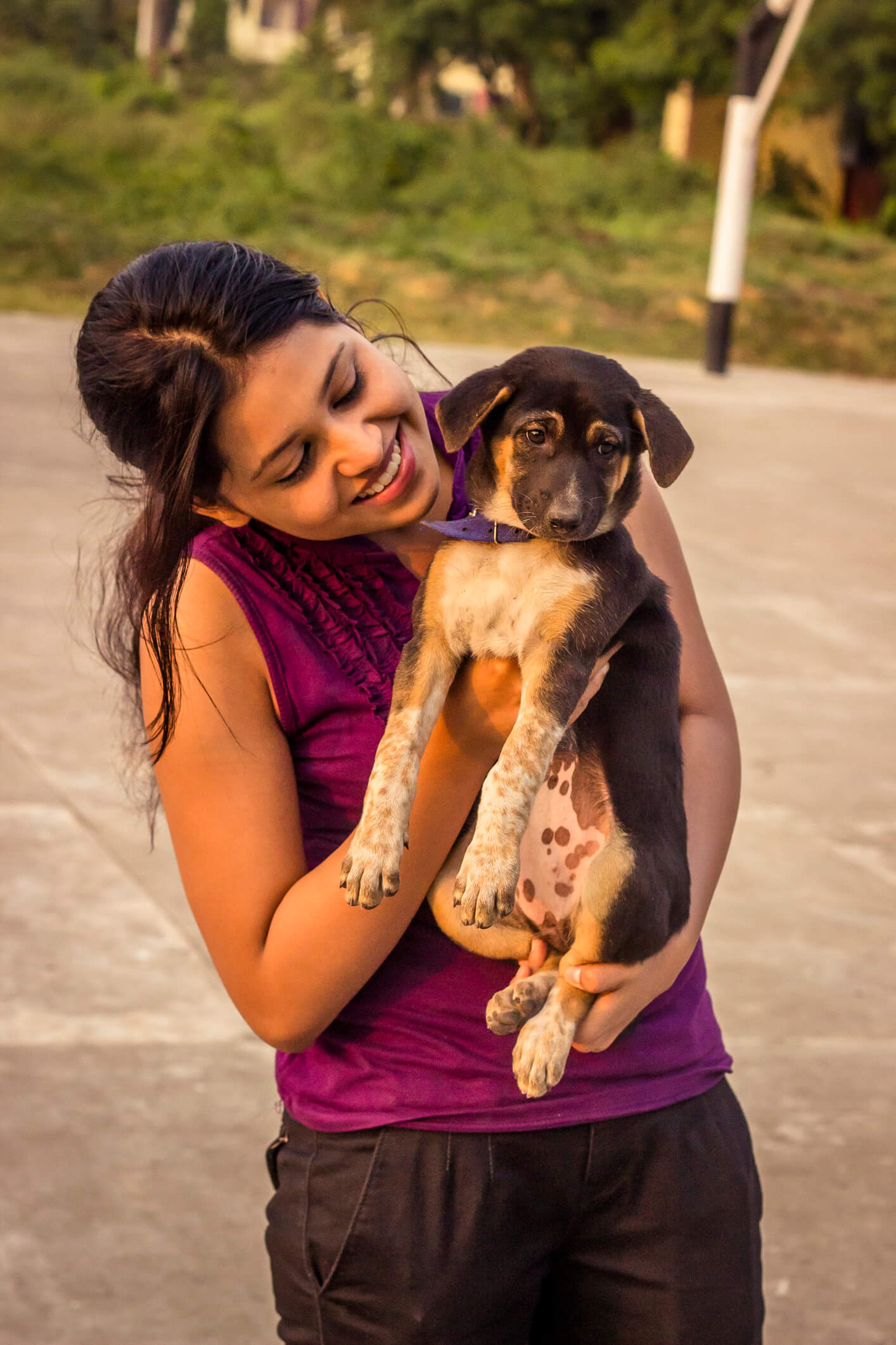 Young teenager woman with little puppy